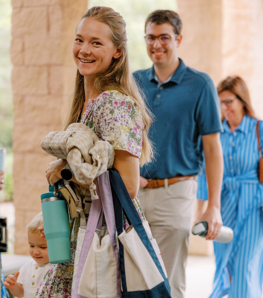 Family with toddler attending church on Sunday